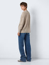 - Knitted cardigan  - Button fastenings through front  - V-neck  - Long sleeves with dropped shoulders  - Ribbed neckline, hem and cuffs  - Front patch pockets  - Relaxed fit