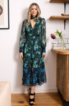 Contrasting green and blue florals decorate the base of this elegant silhouette, completed with velvet trims. The plunge neckline and full sleeves make this the perfect transitional Autumn piece, whilst the button front adds an extra detail. With a shirred back panel for ease of wear, the Babette is a perfect seasonal staple for any event.