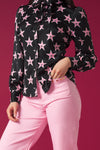 Long puff sleeve blouse. Collar and optional bow tie detail. Front button fastening.