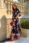 Add serious seasonal vibes style to your wardrobe this season with our new Brielle Black Floral Shirt Maxi Dress. Featuring long sleeves with tailored cuffs, a tie waist, shirt collar, and button detailing to the front. 