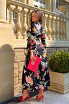 Add serious seasonal vibes style to your wardrobe this season with our new Brielle Black Floral Shirt Maxi Dress. Featuring long sleeves with tailored cuffs, a tie waist, shirt collar, and button detailing to the front. 