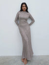Soft jersey fabric

High neckline

Ruched detail at shoulder

Cut-about seam design

Long fitted sleeves

Maxi length