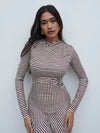 Soft jersey fabric

High neckline

Ruched detail at shoulder

Cut-about seam design

Long fitted sleeves

Maxi length