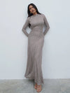 Soft jersey fabric

High neckline

Ruched detail at shoulder

Cut-about seam design

Long fitted sleeves

Maxi length
