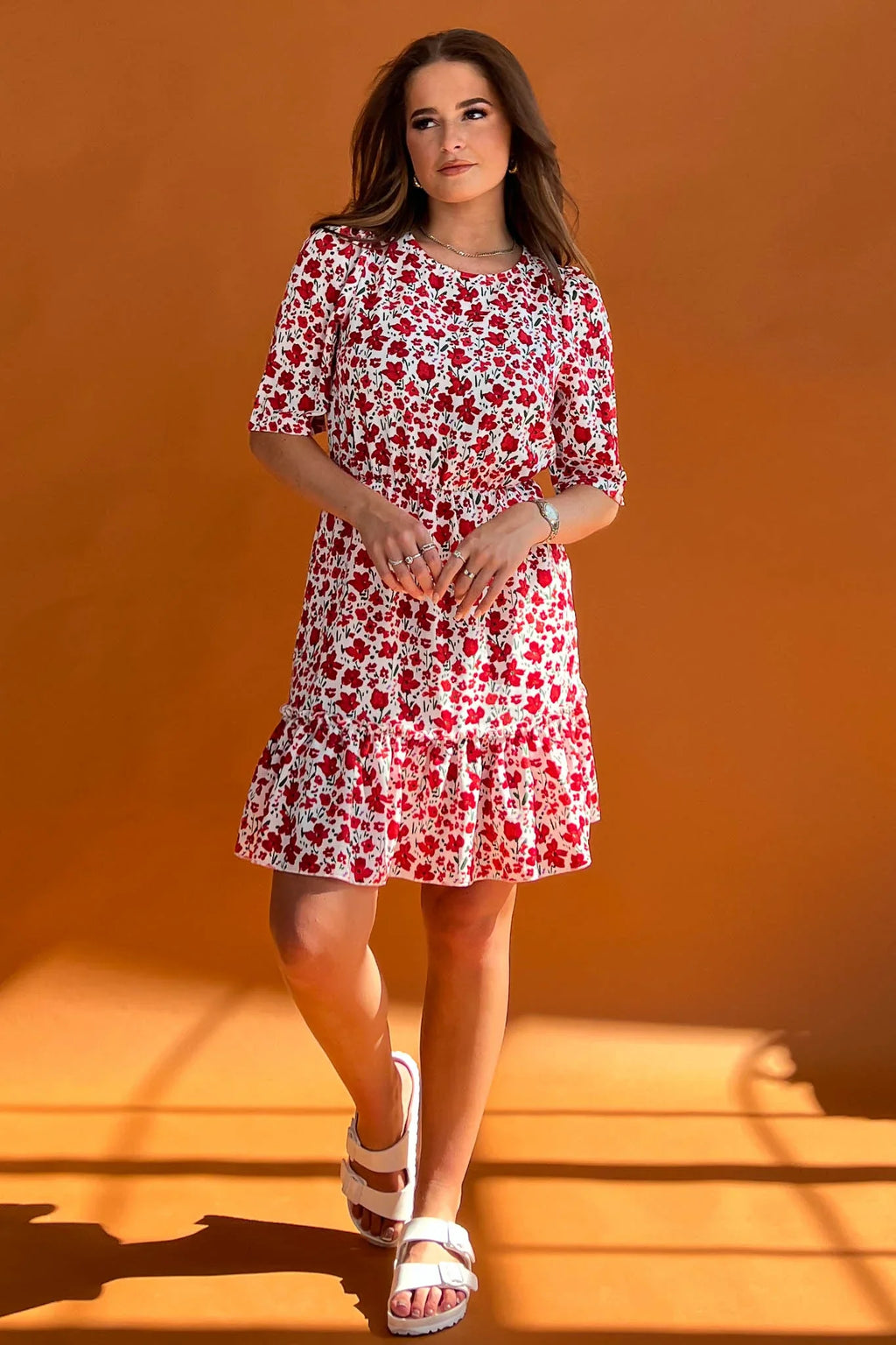 Featuring a cinched in waist, a smock hem and key hole fastening. Pair with chunky heels for a real show stopping look or trainers for casual vibe.
