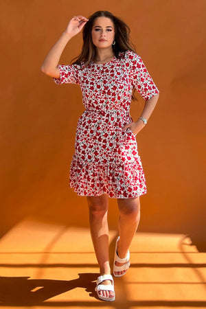Featuring a cinched in waist, a smock hem and key hole fastening. Pair with chunky heels for a real show stopping look or trainers for casual vibe.