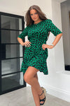 Featuring a cinched in waist, a smock hem and key hole fastening. Pair with chunky heels for a real show stopping look or trainers for casual vibe.