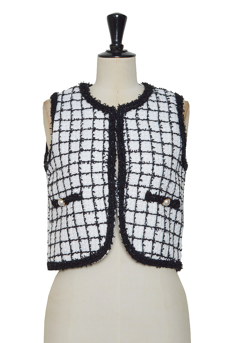Sleeveless tweed vest with piping