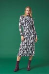 Midi dress with turtleneck. Long sleeves. Gathering detail. Back button fastening.