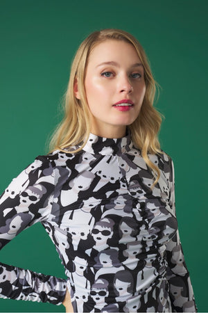 Midi dress with turtleneck. Long sleeves. Gathering detail. Back button fastening.