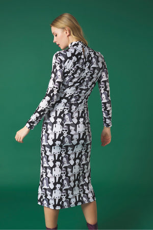 Midi dress with turtleneck. Long sleeves. Gathering detail. Back button fastening.
