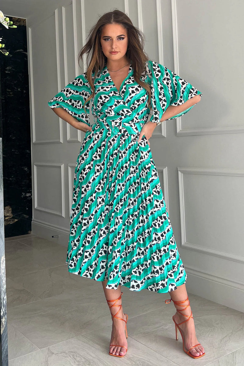Featuring a wrap over neckline & delicate pleated angel sleeves, this midi dress cinches you in at the waist with a large belt with buckle detail creating the perfect silhouette. The invisible zip fastening is perfect for easy on and the pleated midi skirt creates a soft & feminine vibe.