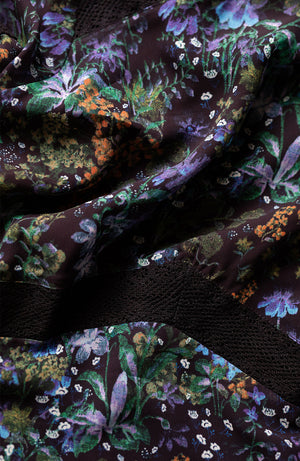 Hand-designed ditsy florals bloom across the dark base in powerful blue, green and orange tones. With tiered skirt and bell sleeves, this figure hugging pencil midi style dress is undeniably flattering. Finished with lace trims, dress up or down for the perfect transitional piece this Autumn.