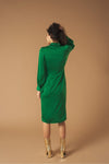 Long sleeve shirt dress. Wrap skirt. Ruffle detail on the skirt. Front button fastening and side zip.