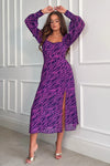 Featuring a sweetheart neckline, long sleeves, cinched in waist and a side slit. Pair with heels for a night out and boots for a casual event 