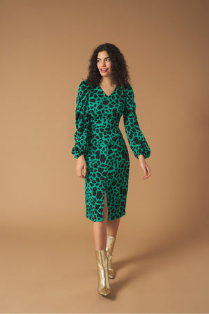 Midi V-neck dress with vent detail on the front. Long puff sleeves. Back zip fastening.