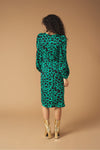 Midi V-neck dress with vent detail on the front. Long puff sleeves. Back zip fastening.
