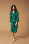 Midi V-neck dress with vent detail on the front. Long puff sleeves. Back zip fastening.