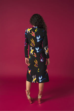 Round neck dress with long sleeves. Front knot detail. Front vent. Back zip fastening.