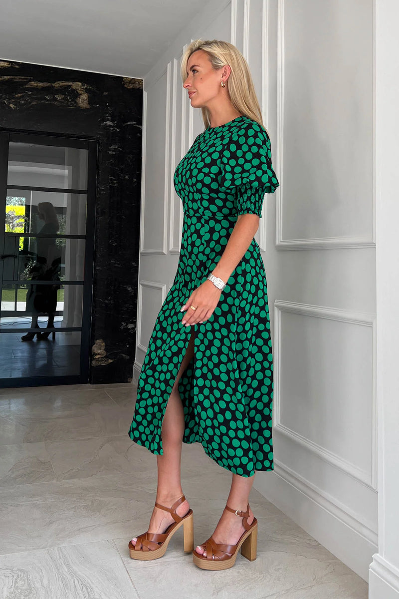 Simple yet classic, our Shayla Midi Dress radiates pure elegance and sophistication. The form-flattering style contours your curves and features 3/4 sleeves with an elasticated cuff creating a subtle puff styling, and thigh high split for a gorgeous twist on a staple dres