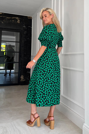 Simple yet classic, our Shayla Midi Dress radiates pure elegance and sophistication. The form-flattering style contours your curves and features 3/4 sleeves with an elasticated cuff creating a subtle puff styling, and thigh high split for a gorgeous twist on a staple dres