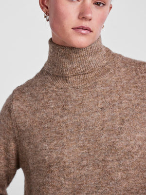 - Turtleneck  - Dropped shoulders  - Long sleeves  - Ribbed trims  - Side slit details  - Midi length  - Relaxed fit