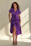 Its wrap design, floral pattern and midi length make it perfect for any occasion. 