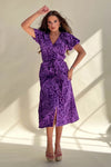 Its wrap design, floral pattern and midi length make it perfect for any occasion. 
