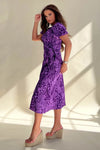 Its wrap design, floral pattern and midi length make it perfect for any occasion. 