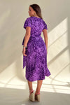 Its wrap design, floral pattern and midi length make it perfect for any occasion. 