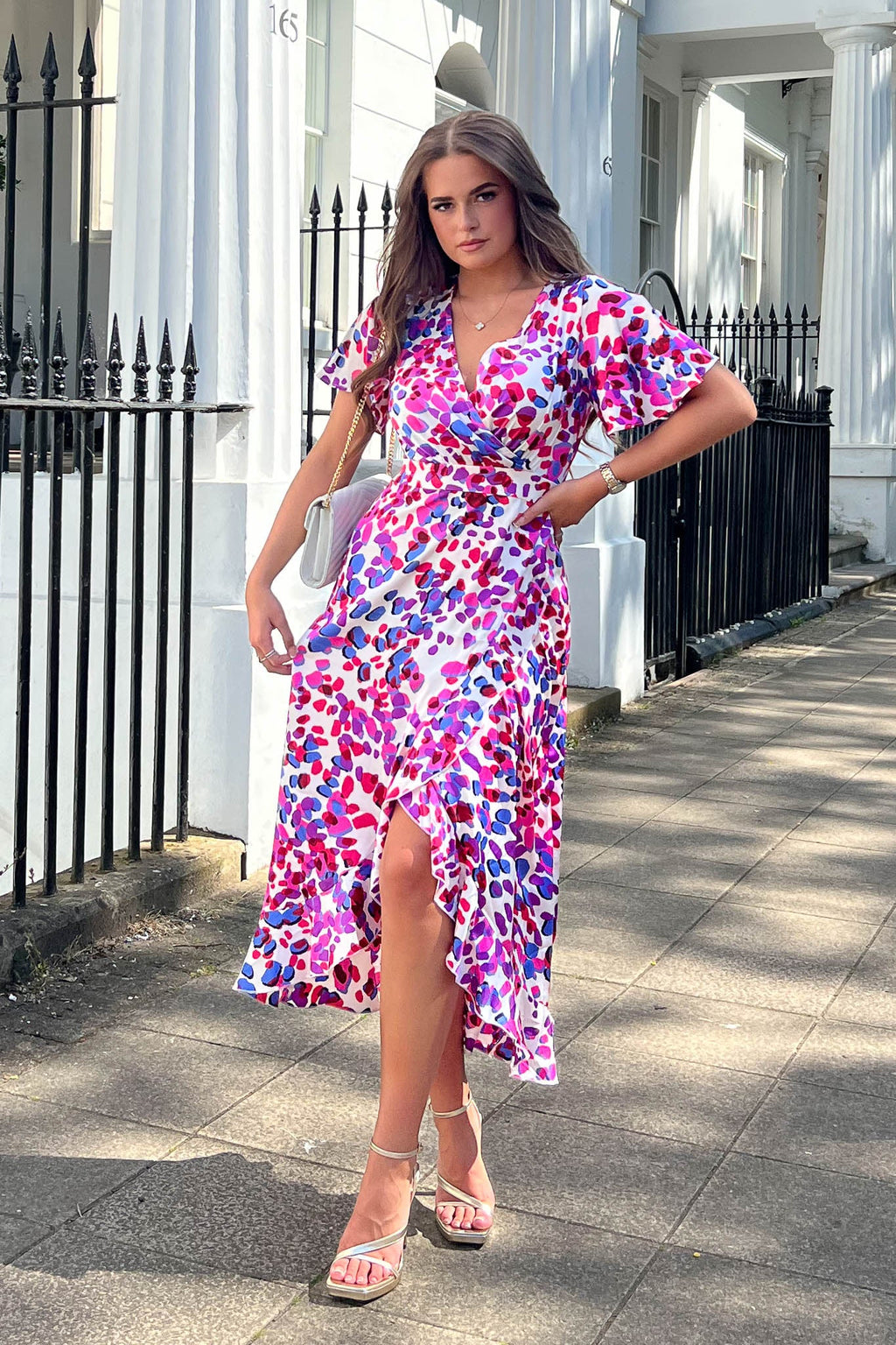 Featuring a wrap over neckline with batwing style sleeve and curve contouring fit for an hourglass effect. With added frill detail to create a voluminous look, this dress is pure elegance and a must have this seaso