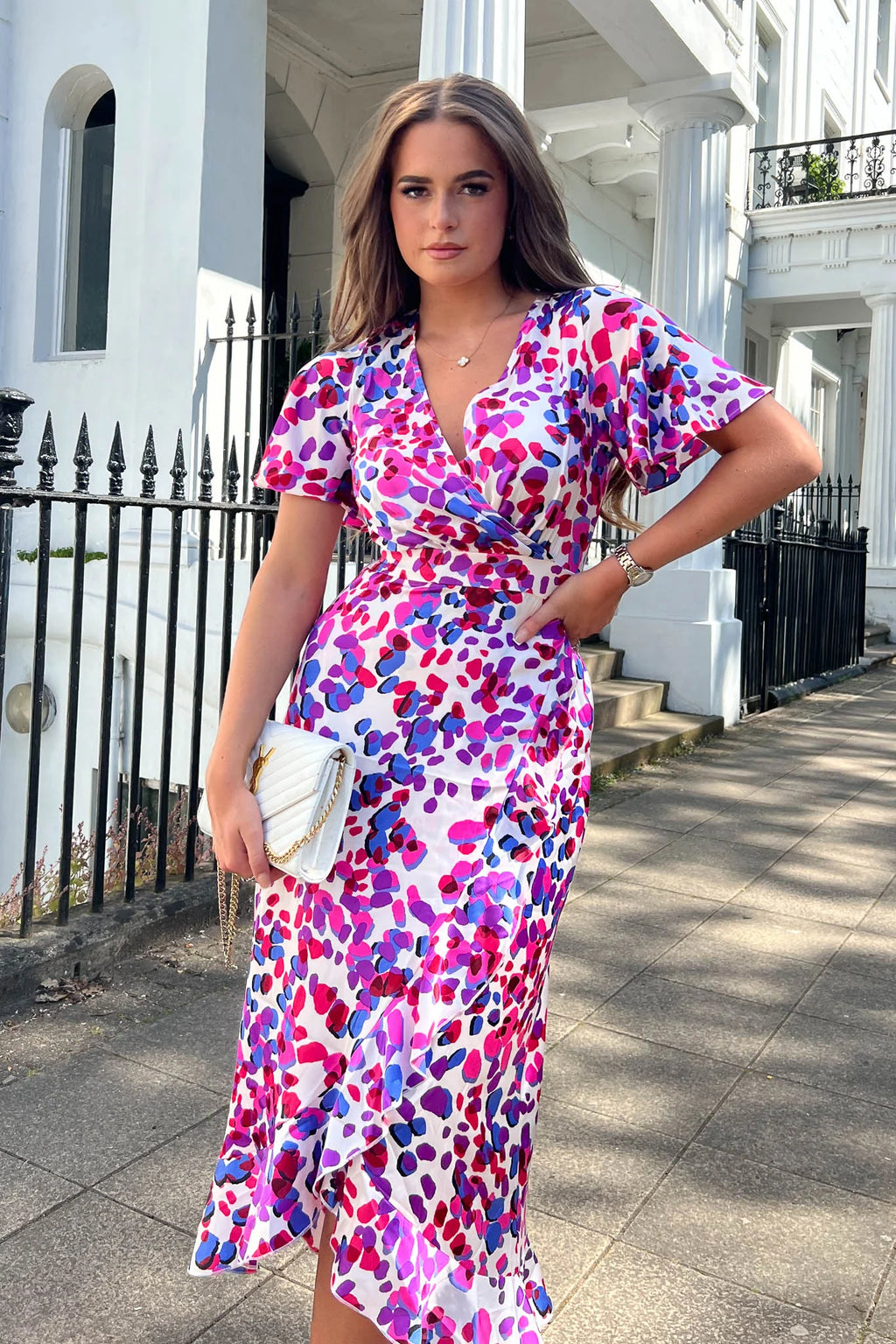 Featuring a wrap over neckline with batwing style sleeve and curve contouring fit for an hourglass effect. With added frill detail to create a voluminous look, this dress is pure elegance and a must have this seaso