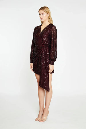 Sequin mini dress featuring an ultra flattering wrap-front silhouette and cuffed long sleeves, you'll look effortlessly stylish and feel comfortable all night long.
