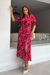 The form-flattering style contours your curves and features 3/4 sleeves with an elasticated cuff creating a subtle puff styling, and thigh high split for a gorgeous twist on a staple dress