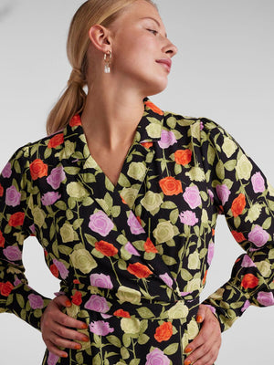 - Wrap front with notched lapels  - Gathered detail at shoulders  - Long sleeves  - Elongated buttoned cuffs  - Cutline at waist with side tie fastening  - Draped hemline  - All-over floral print  - Midi length  - Regular fit