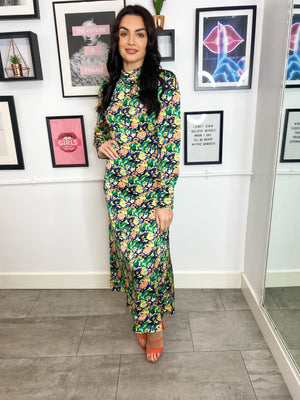 Our stuning Davina midi dress, featuring high neck and long sleeve, midi length. It's the perfect occasion dress, don't you agree?  Model wears XS.  - Back zip fastening  - Gathered effect at chest  - Long sleeves  - Banded cuffs  - All-over floral print  - Regular fit