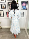 Sailor inspired, mock wrap dress featuring cap sleeves and peplum trim detailing.   How stunning? Paired with a wedge for that summer time day drinks look or easily swap out the wedges for a strappy heel and you're ready for cocktails.   Model wears size 8. 
