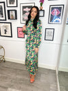 Our stuning Davina midi dress, featuring high neck and long sleeve, midi length. It's the perfect occasion dress, don't you agree?  Model wears XS.  - Back zip fastening  - Gathered effect at chest  - Long sleeves  - Banded cuffs  - All-over floral print  - Regular fit
