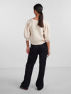 - V-neck  - Button-up front  - Half-length puff sleeves  - Ribbed trims  - Fluffy texture  - Regular fit