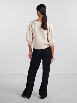 - V-neck  - Button-up front  - Half-length puff sleeves  - Ribbed trims  - Fluffy texture  - Regular fit