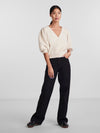 - V-neck  - Button-up front  - Half-length puff sleeves  - Ribbed trims  - Fluffy texture  - Regular fit
