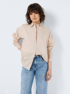 - Oversize shirt  - Button fastenings through front  - Long sleeves with dropped shoulders  - Pointed collar  - Button fastening at cuffs  - Cotton and linen blend material