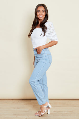 This top is a wardrobe basic. Paired with jeans, tailored trousers … the options are endless. Featuring a broderie contrasting sleeve and square neckline. 